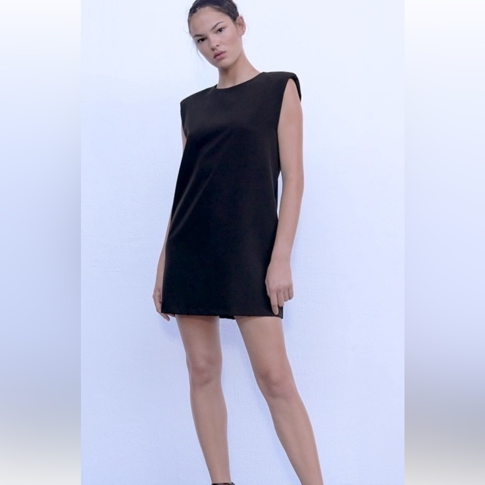 Black Zara shift dress with shoulder pads.